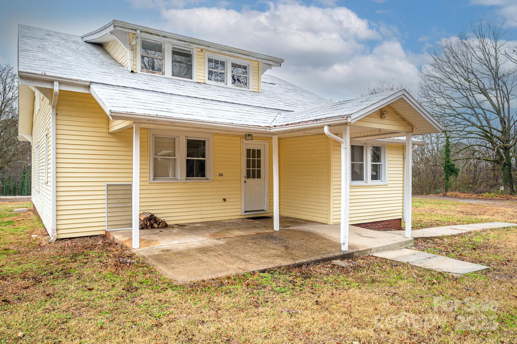 2645 Kool Park Road Northeast Hickory, NC 28601 - Photo 34 of 46 a view of a house with a yard and garage