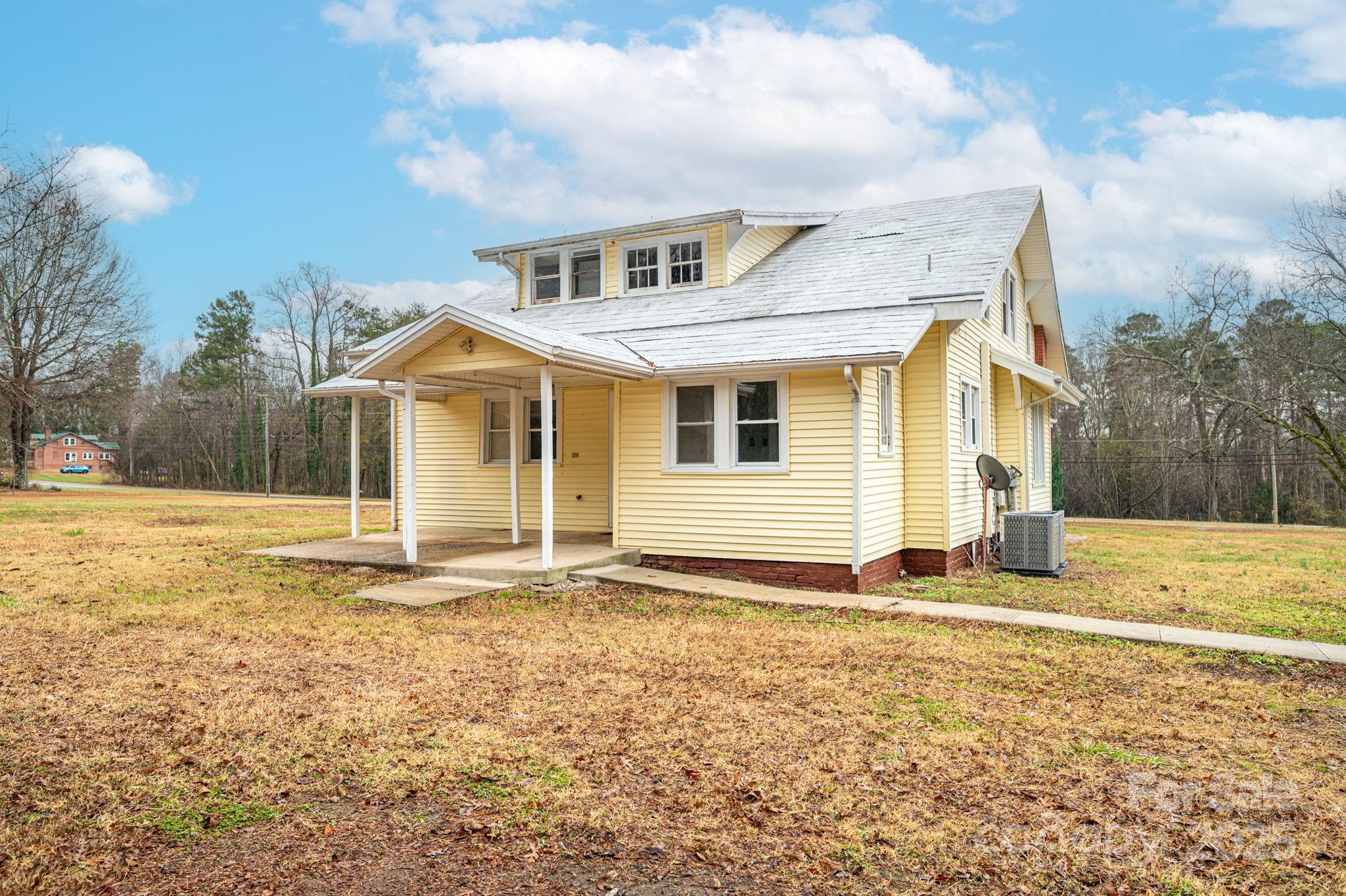 2645 Kool Park Road Northeast Hickory, NC 28601 - Photo 36 of 46 a front view of a house with a yard