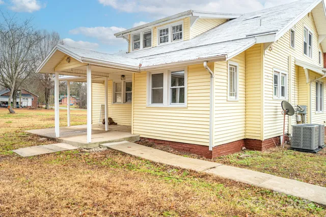 a view of a forest from a balcony