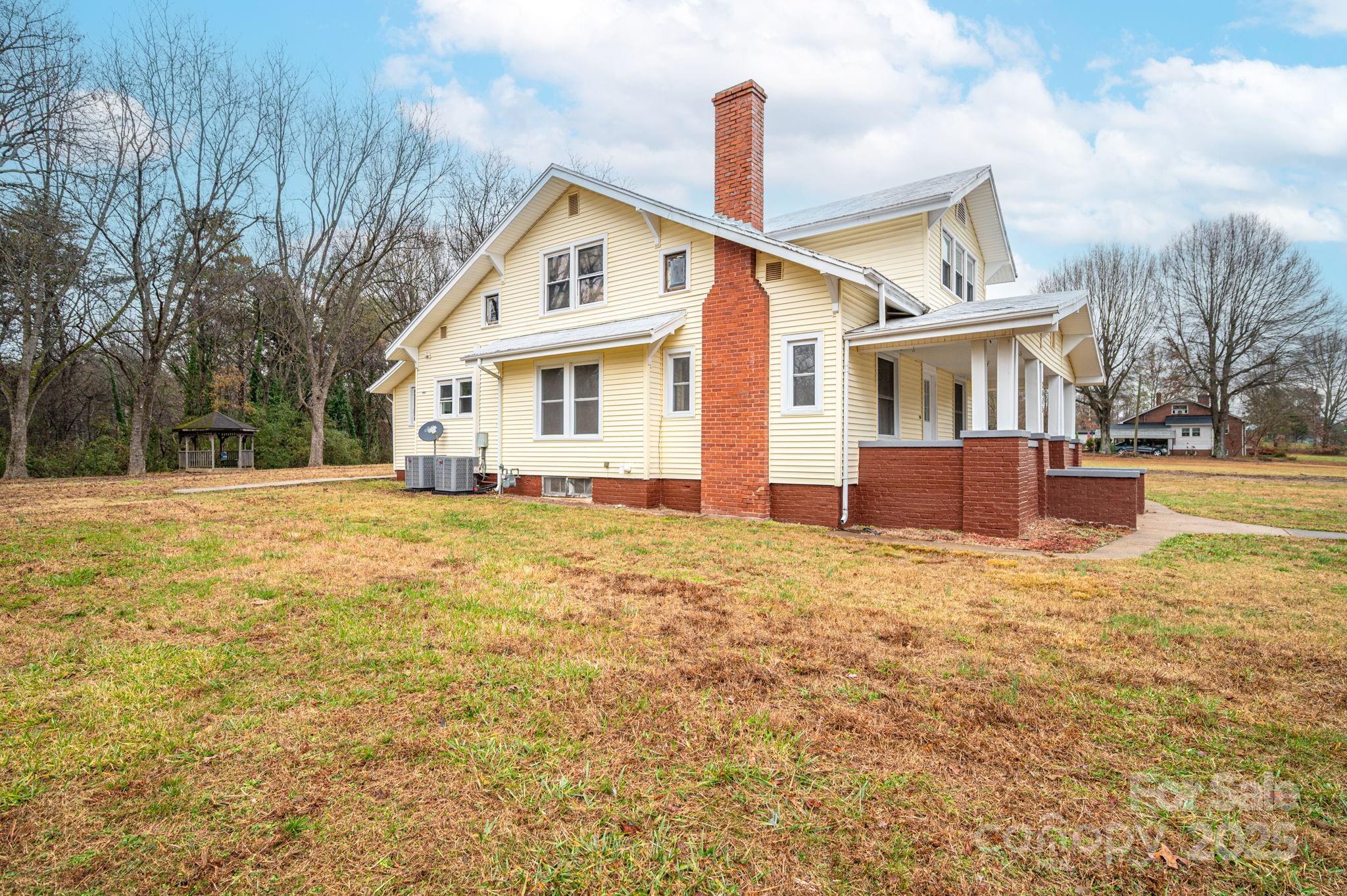 2645 Kool Park Road Northeast Hickory, NC 28601 - Photo 38 of 46 a front view of a house with a yard