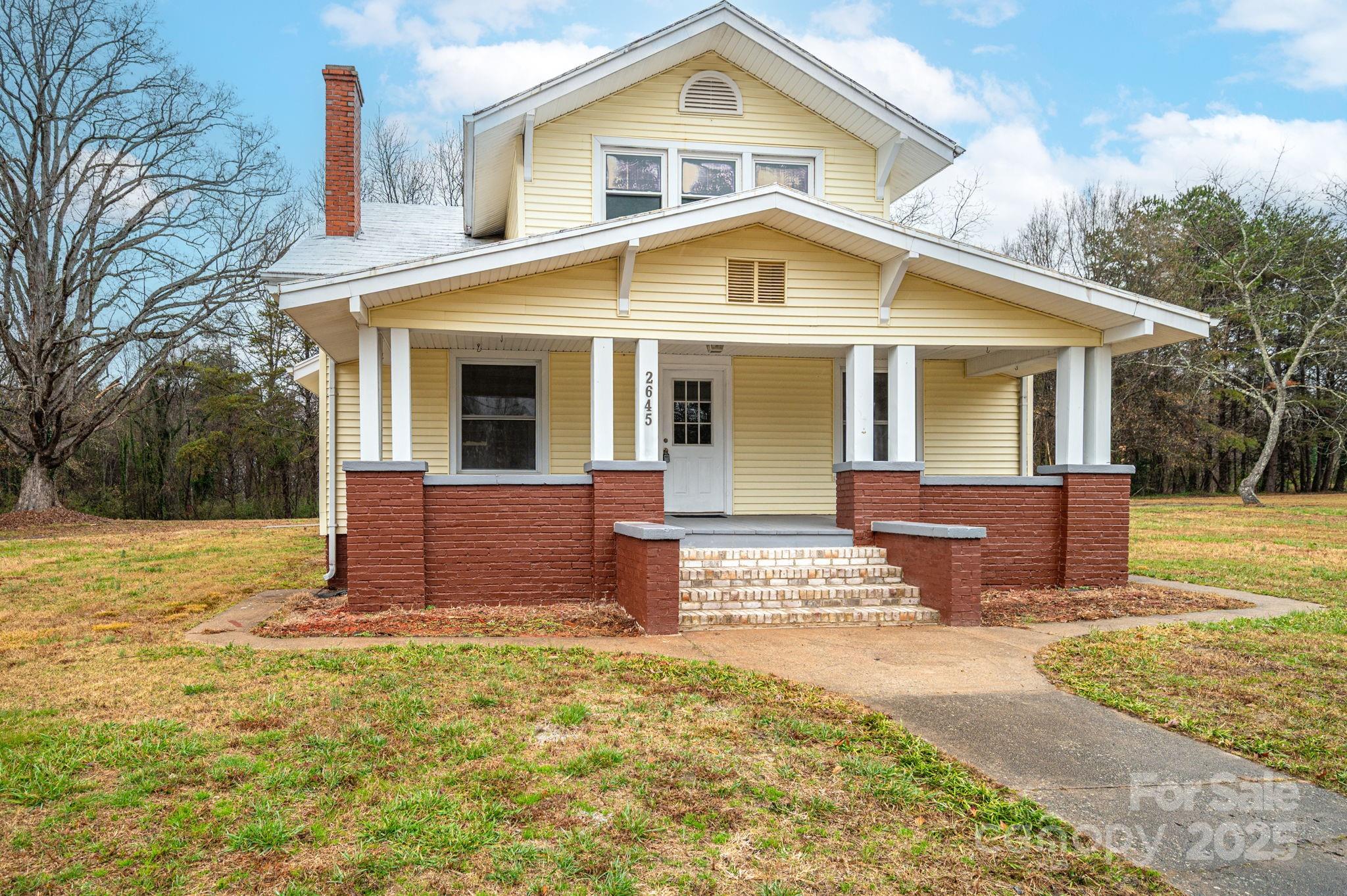 2645 Kool Park Road Northeast Hickory, NC 28601 - Photo 44 of 46 a front view of a house with a yard