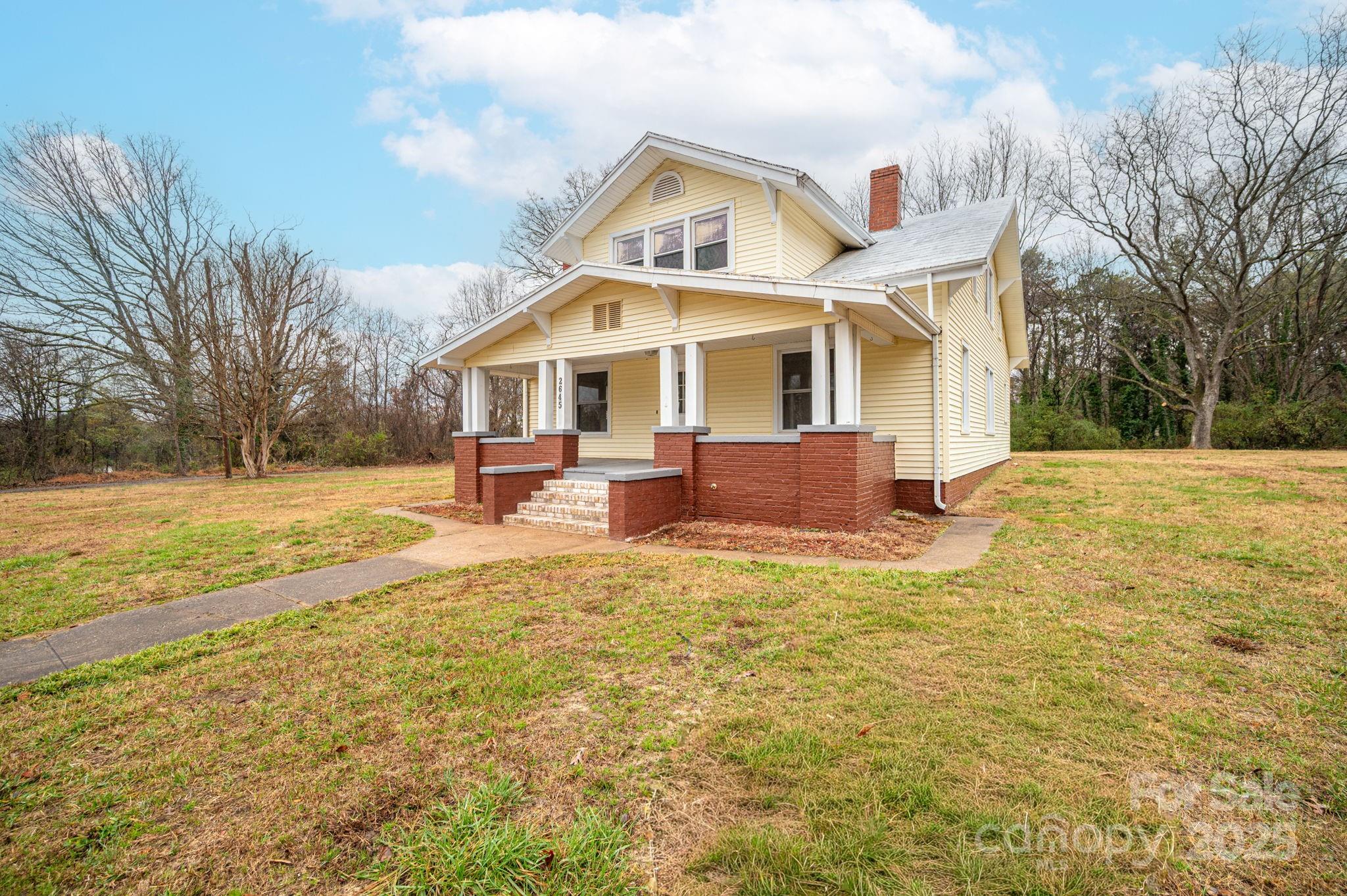 2645 Kool Park Road Northeast Hickory, NC 28601 - Photo 6 of 46 a front view of house with yard and trees around