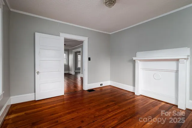 a view of a livingroom with wooden floor