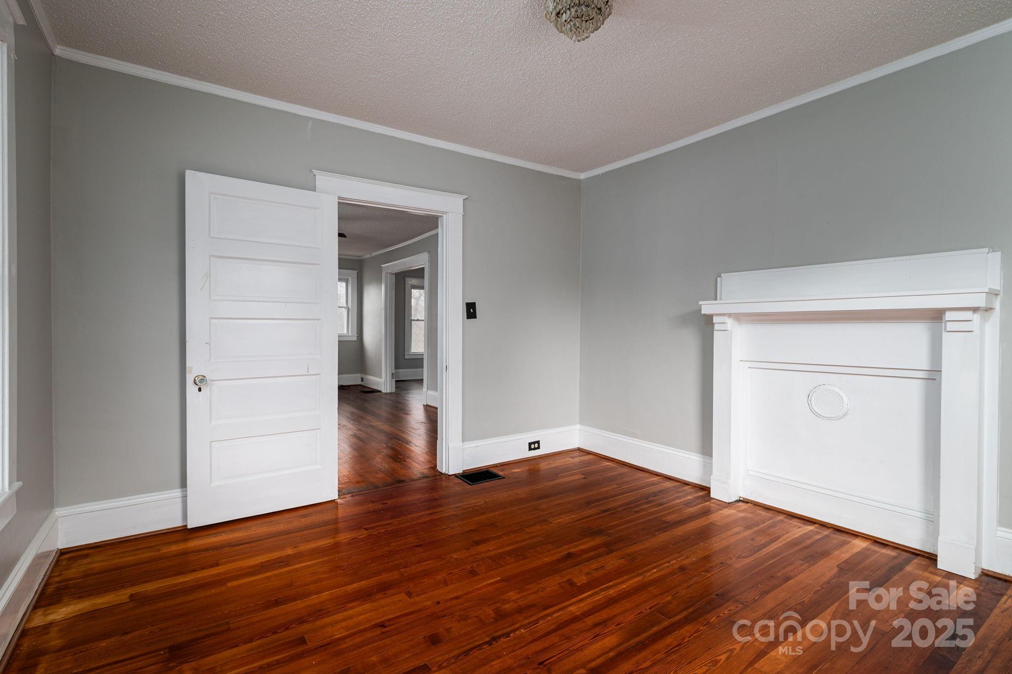 2645 Kool Park Road Northeast Hickory, NC 28601 - Photo 9 of 46 a view of empty room with wooden floor