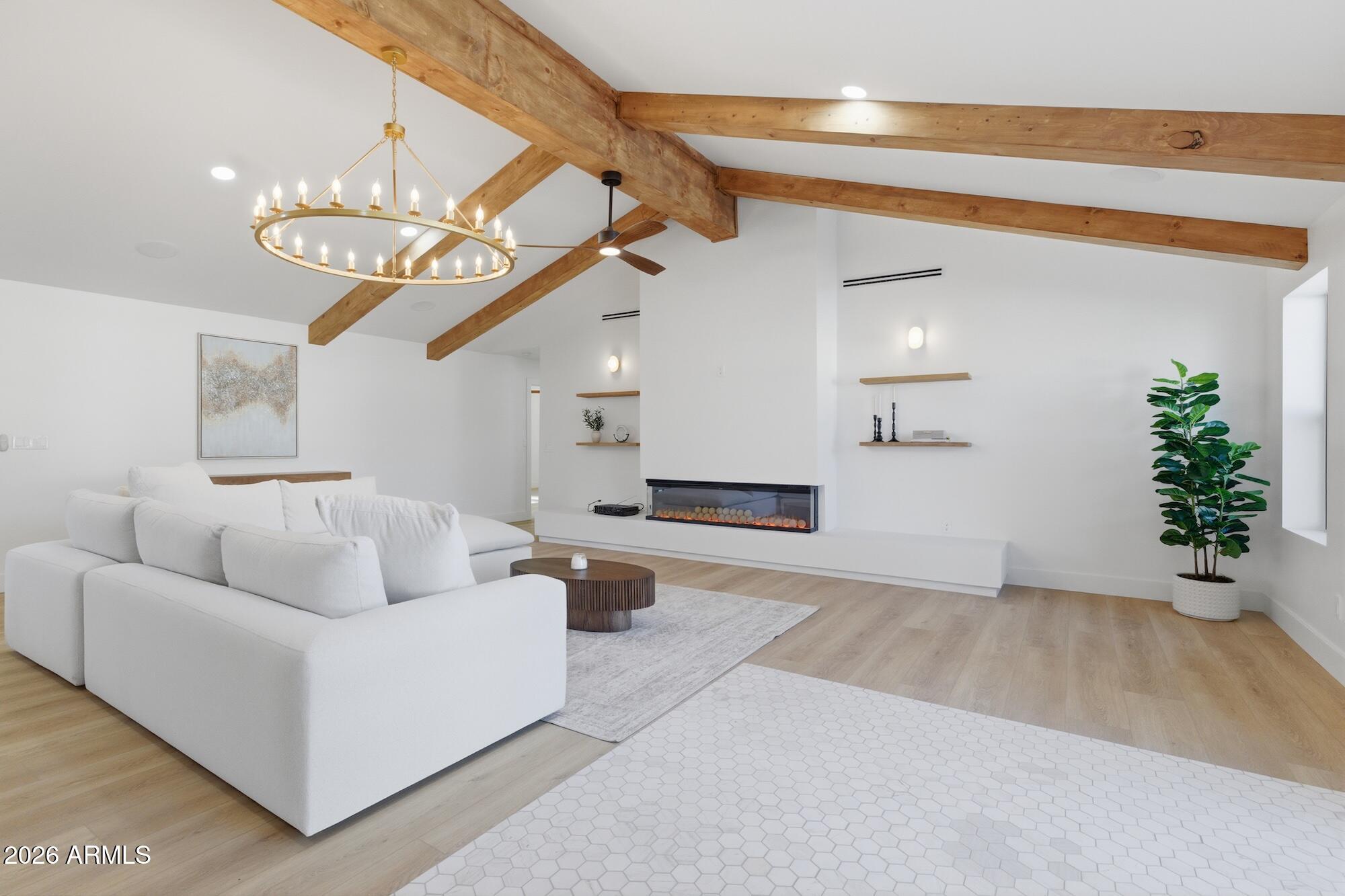 333 West Seldon Lane Phoenix, AZ 85021 - Photo 14 of 73 a living room with furniture and a chandelier