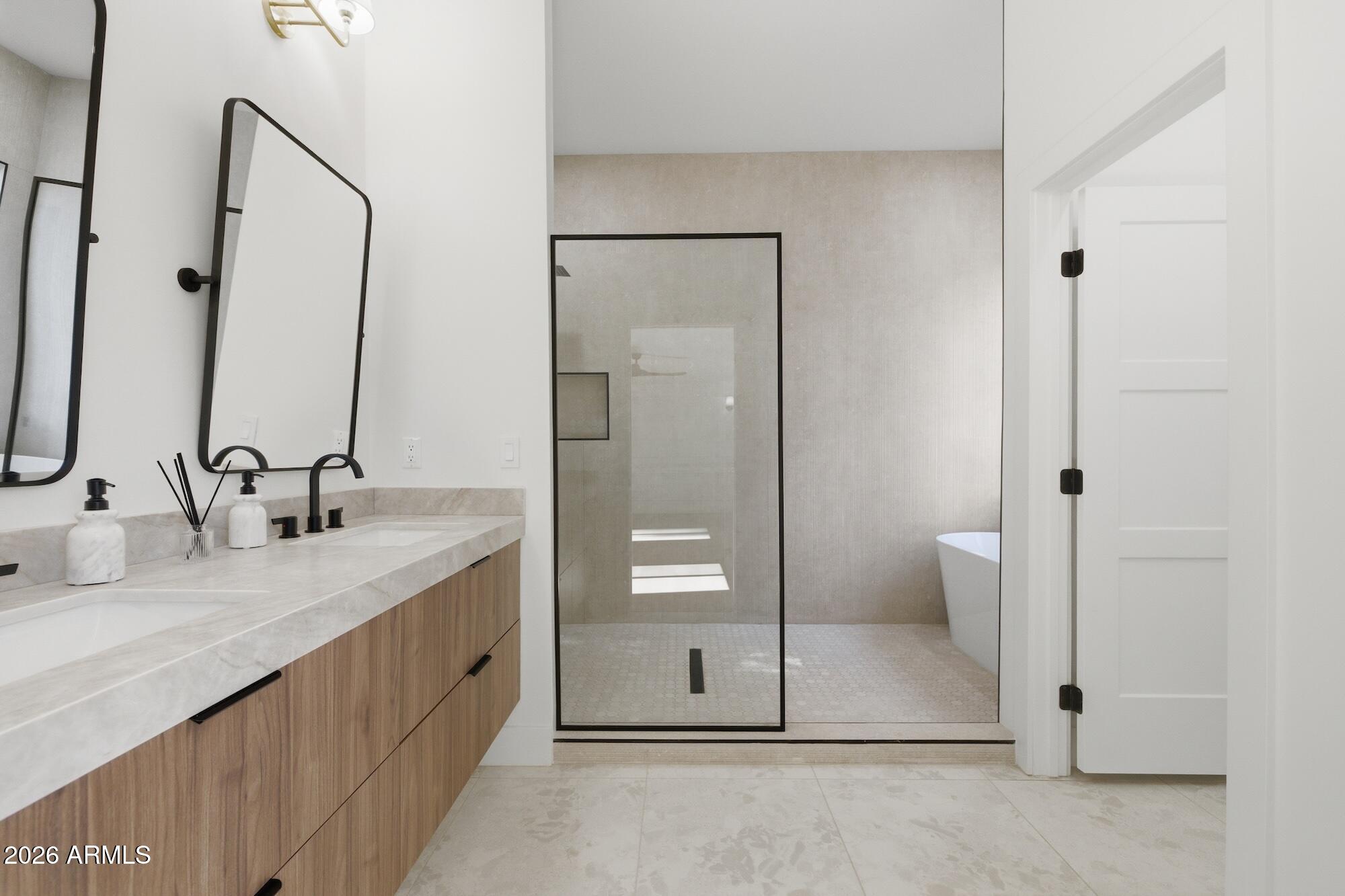 333 West Seldon Lane Phoenix, AZ 85021 - Photo 43 of 73 a bathroom with a granite countertop sink and a mirror