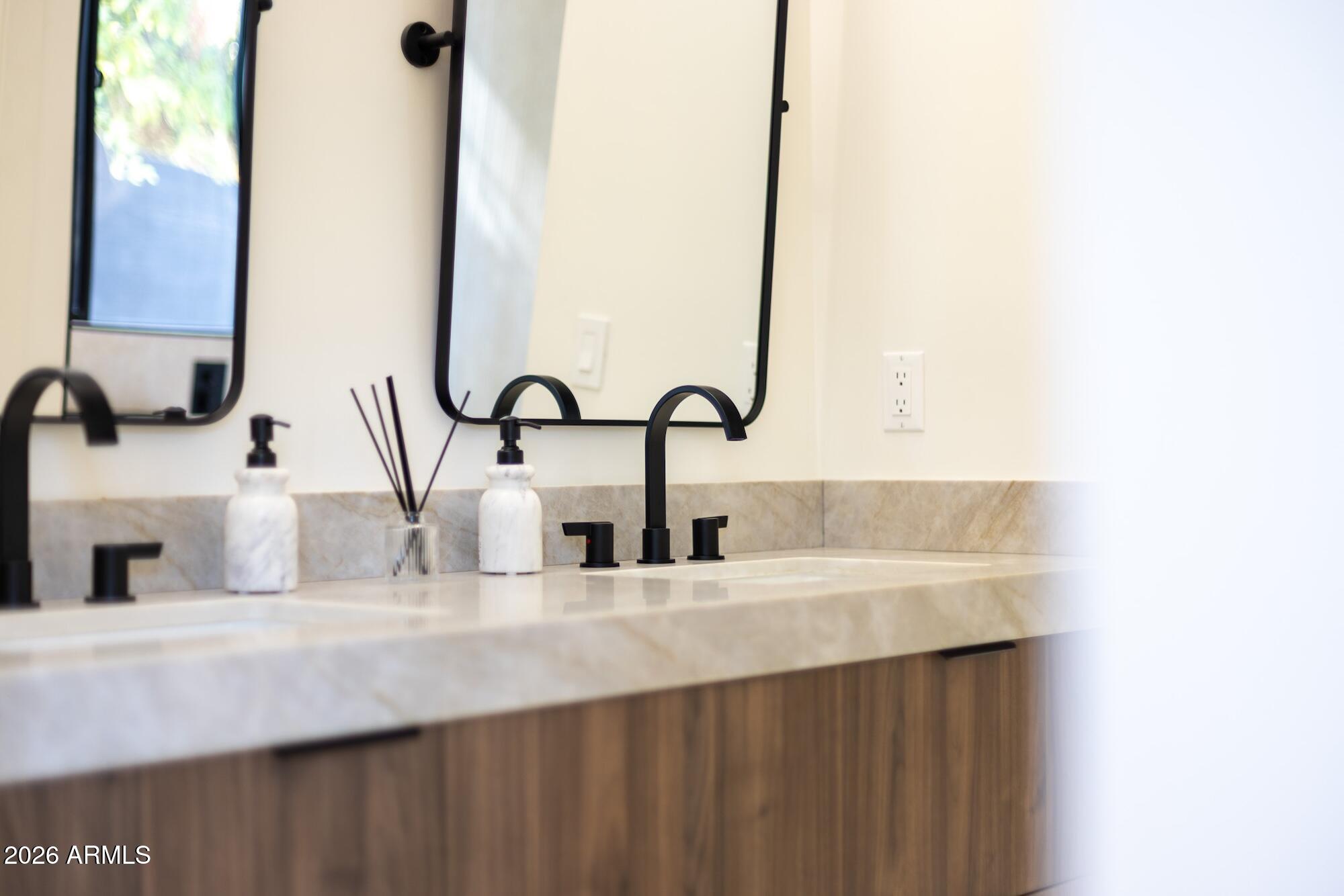 333 West Seldon Lane Phoenix, AZ 85021 - Photo 49 of 73 a bathroom with a sink and a mirror