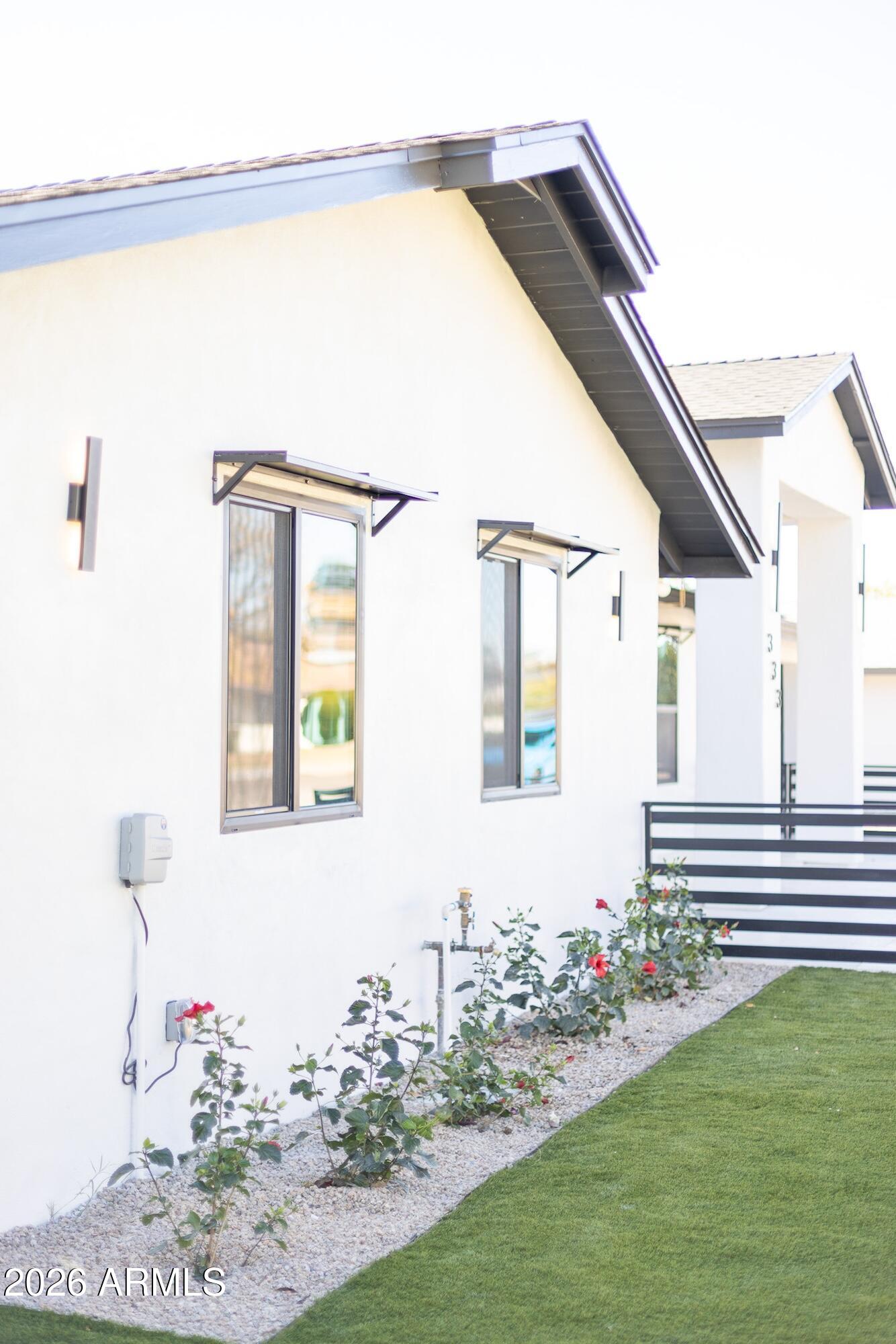 333 West Seldon Lane Phoenix, AZ 85021 - Photo 70 of 73 a front view of a house with garden