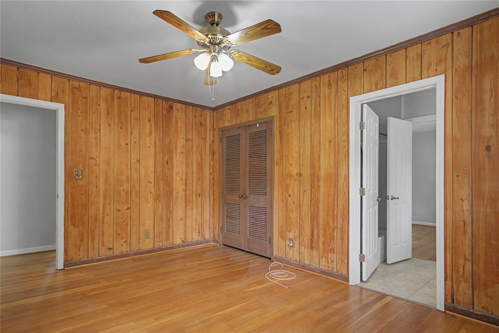 1001 Wiley Bridge Road Woodstock, GA 30188 - Photo 16 of 40 wooden floor in an empty room