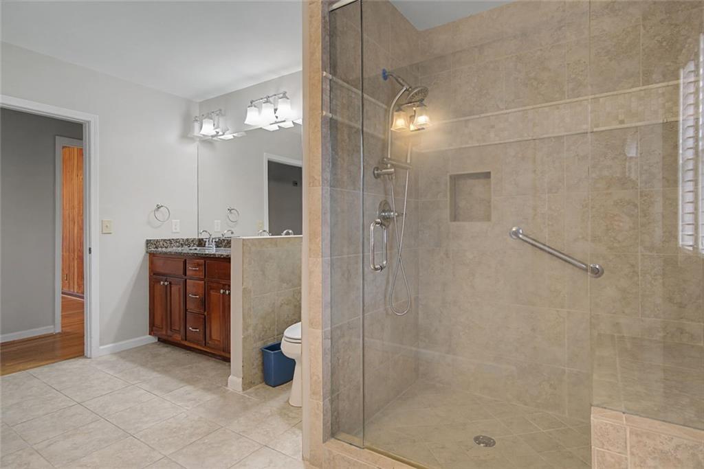 1001 Wiley Bridge Road Woodstock, GA 30188 - Photo 21 of 40 a bathroom with a shower and a sink