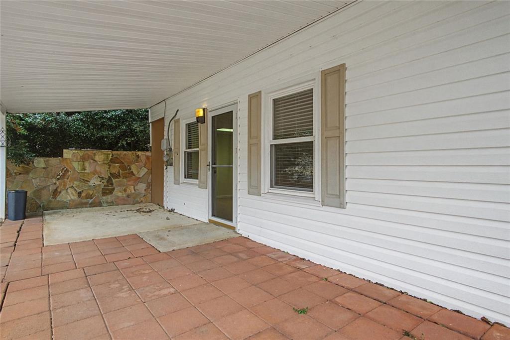 1001 Wiley Bridge Road Woodstock, GA 30188 - Photo 32 of 40 a view of house with backyard