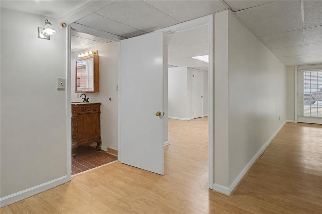 1001 Wiley Bridge Road Woodstock, GA 30188 - Photo 37 of 40 wooden floor in an empty room