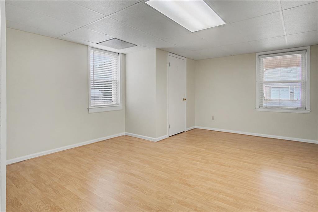1001 Wiley Bridge Road Woodstock, GA 30188 - Photo 39 of 40 an empty room with windows