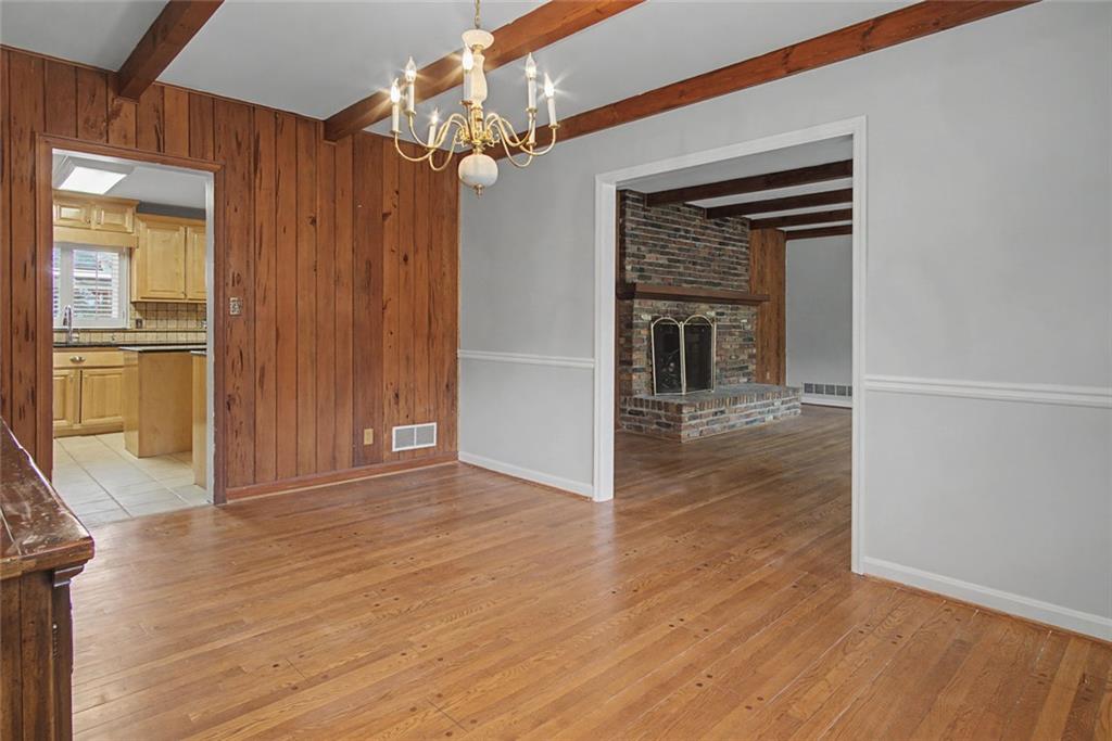 1001 Wiley Bridge Road Woodstock, GA 30188 - Photo 9 of 40 a view of a livingroom with wooden floor