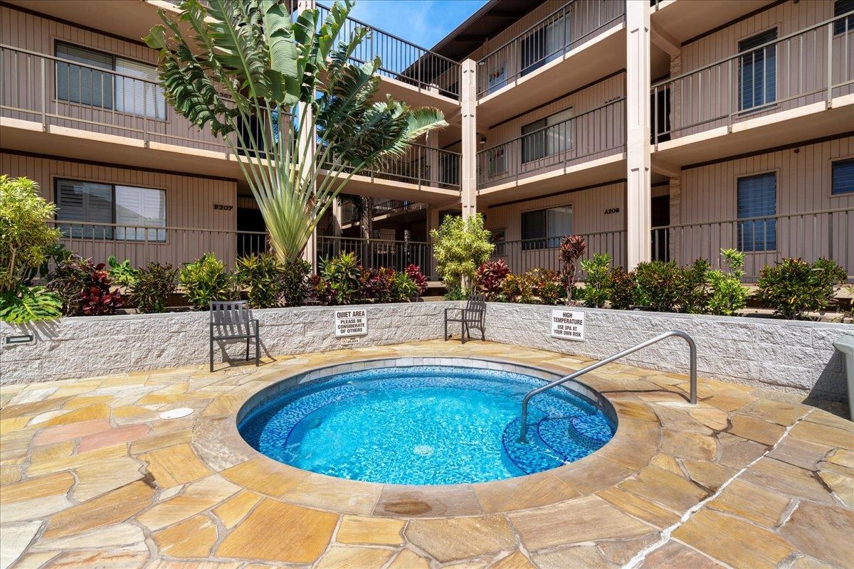 2387 South Kihei Road, Unit B303 Kihei, HI 96753 - Photo 33 of 48 a view of a house with swimming pool