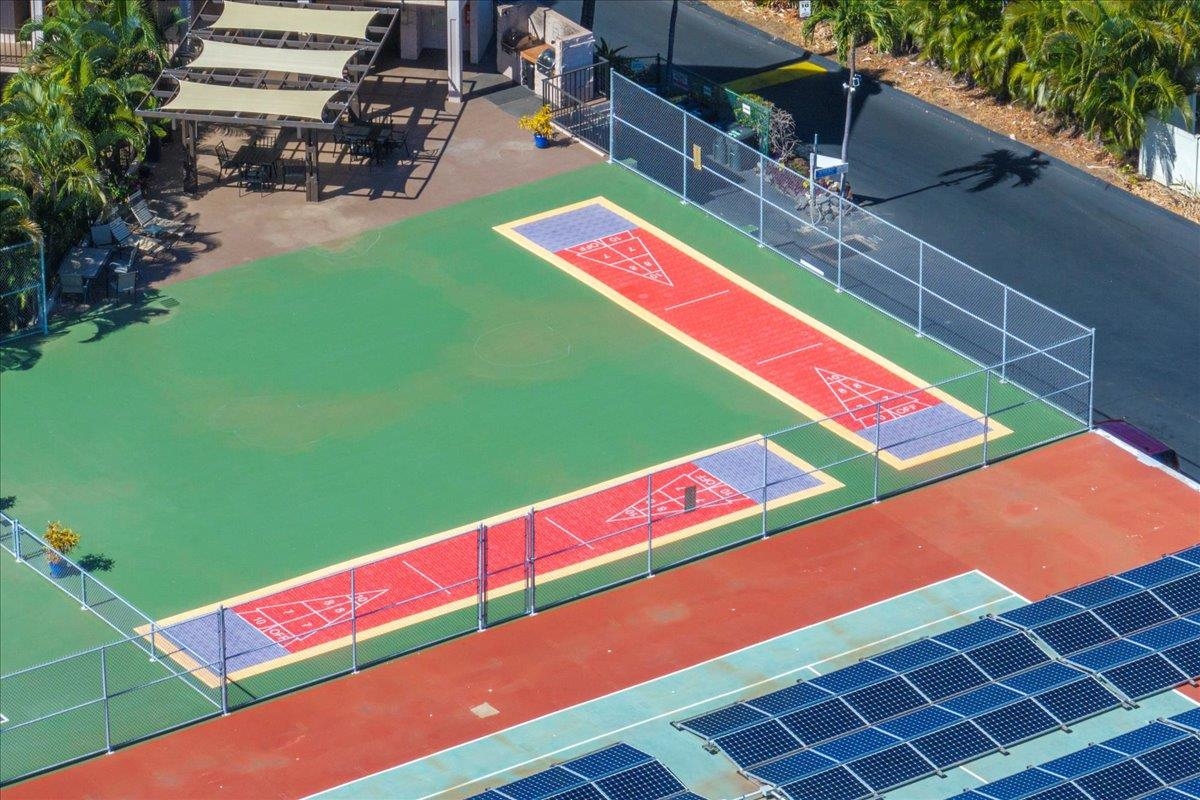 2387 South Kihei Road, Unit B303 Kihei, HI 96753 - Photo 35 of 48 a view of a tennis ground with large trees