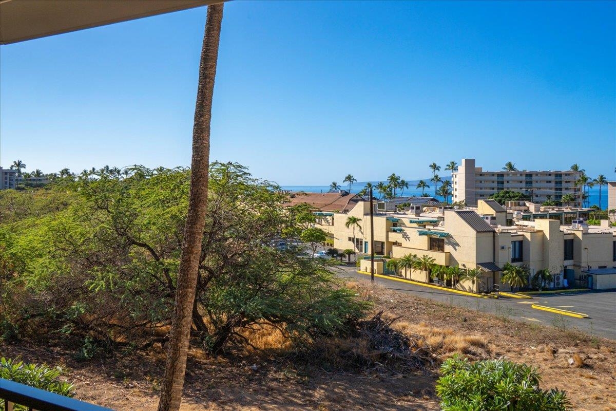 2387 South Kihei Road, Unit B303 Kihei, HI 96753 - Photo 42 of 48 a view of a city with tall buildings