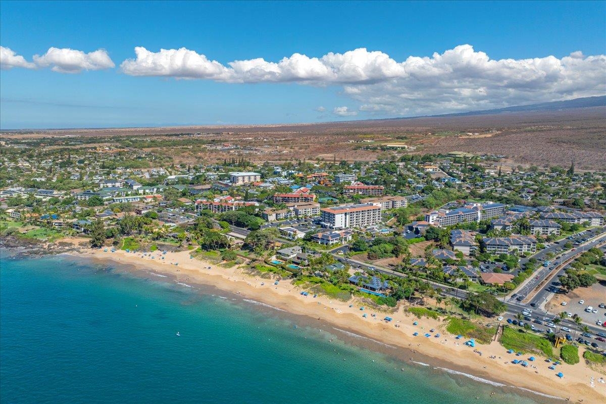 2387 South Kihei Road, Unit B303 Kihei, HI 96753 - Photo 45 of 48 an aerial view of residential houses with outdoor space and trees