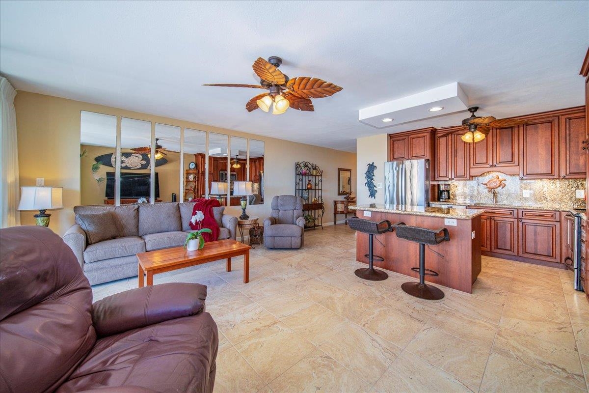 2387 South Kihei Road, Unit B303 Kihei, HI 96753 - Photo 8 of 48 a living room with furniture kitchen view and a window