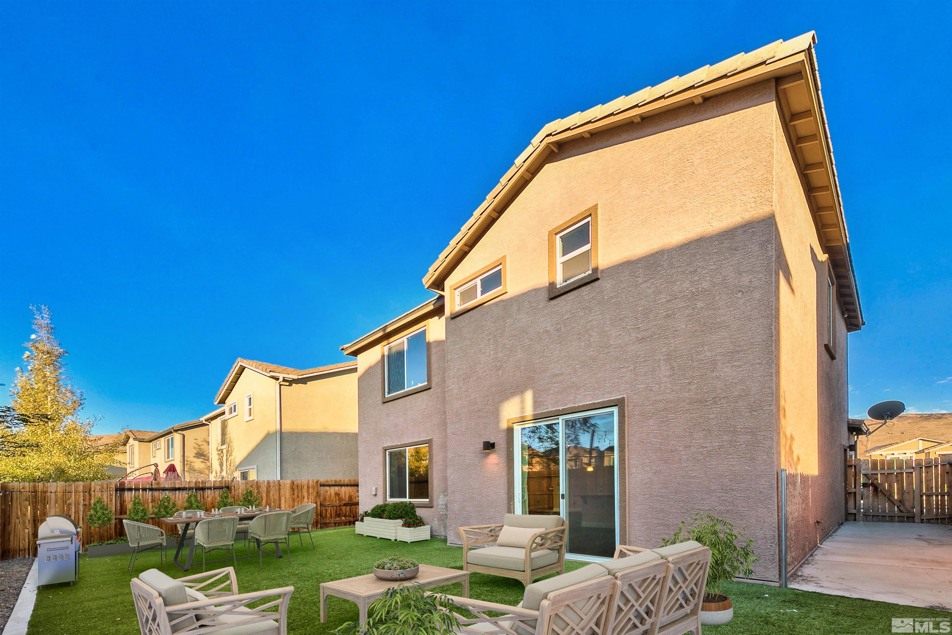 2330 Soprano Drive Reno, NV 89521 - Photo 3 of 29 a view of a house with a backyard