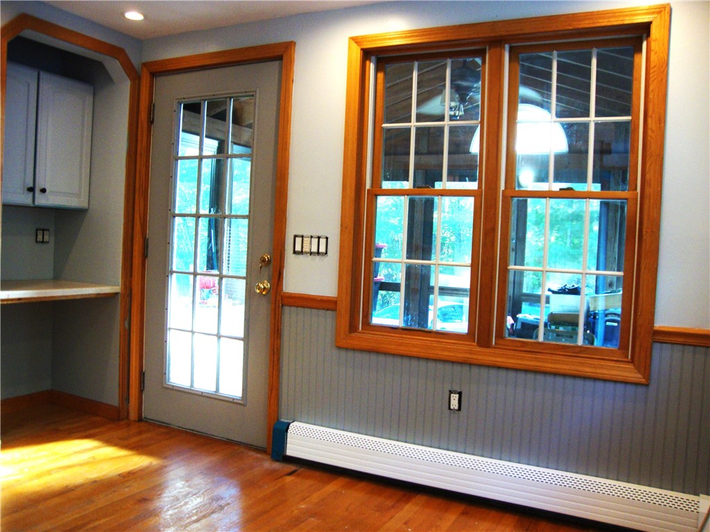 239 John Potter Road West Greenwich, RI 02817 - Photo 11 of 23 view into 3 season room