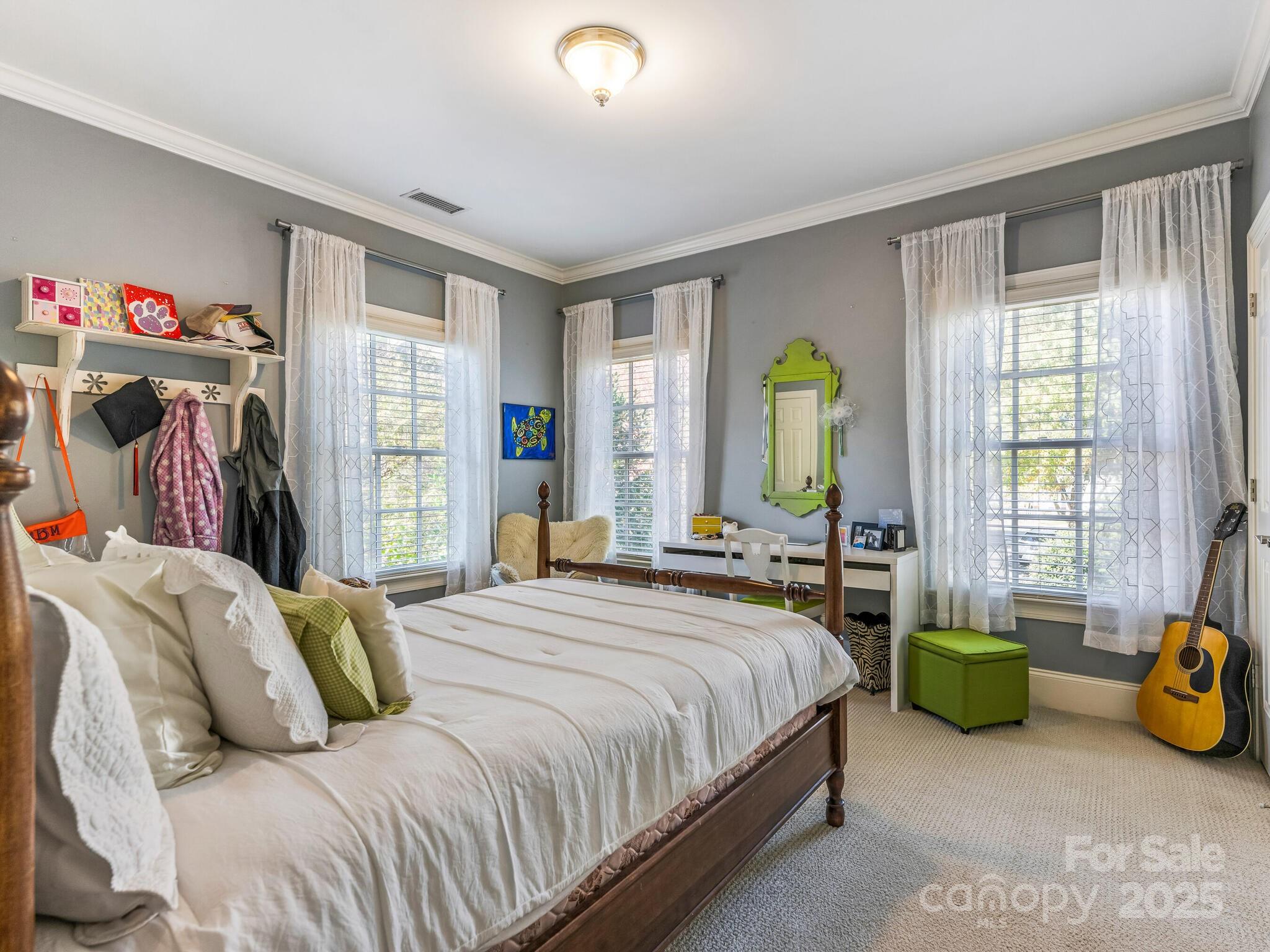 1110 Princeton Avenue Charlotte, NC 28209 - Photo 21 of 29 a bedroom with bed and a window