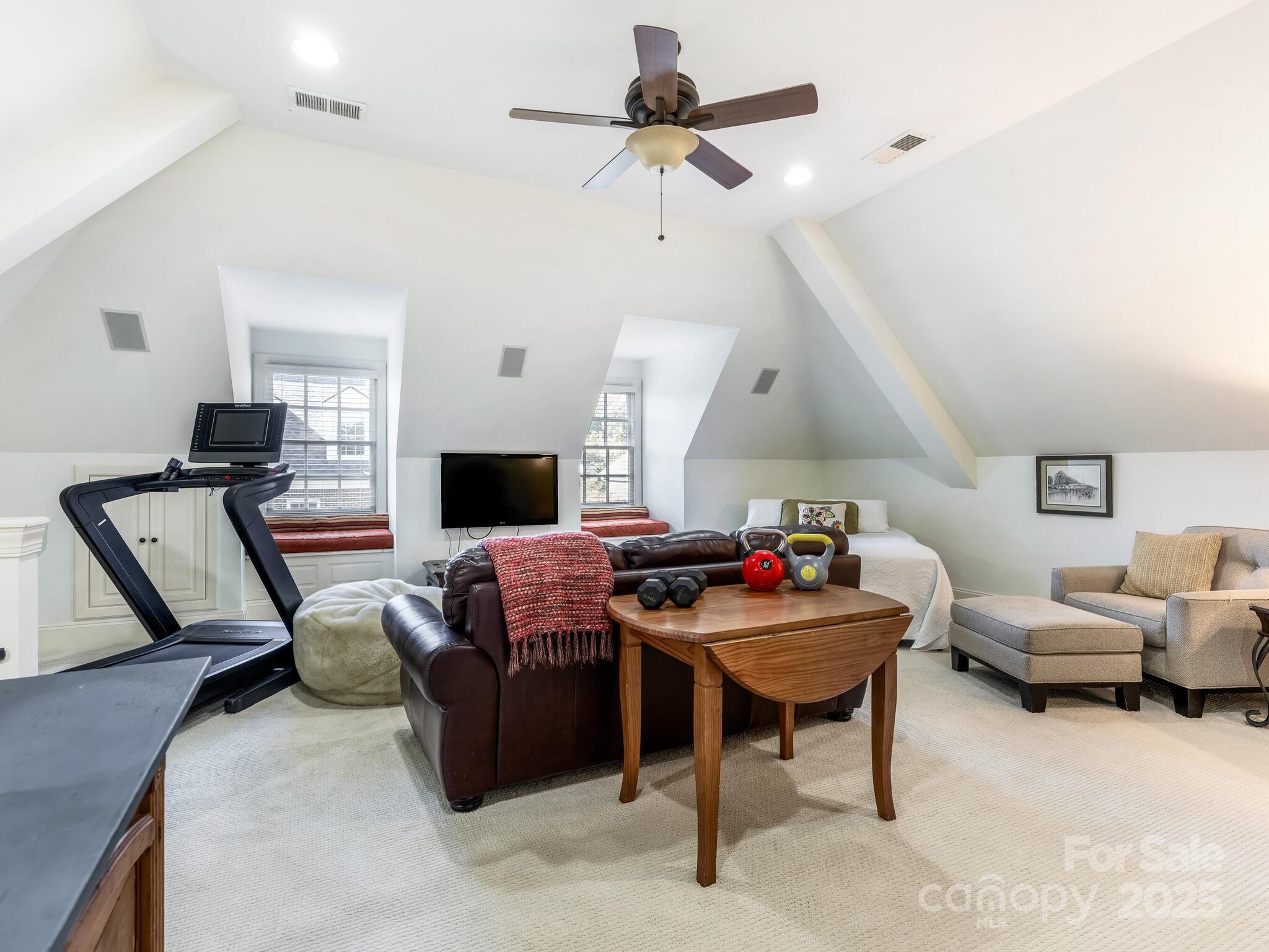 1110 Princeton Avenue Charlotte, NC 28209 - Photo 23 of 29 a living room with furniture and a fireplace