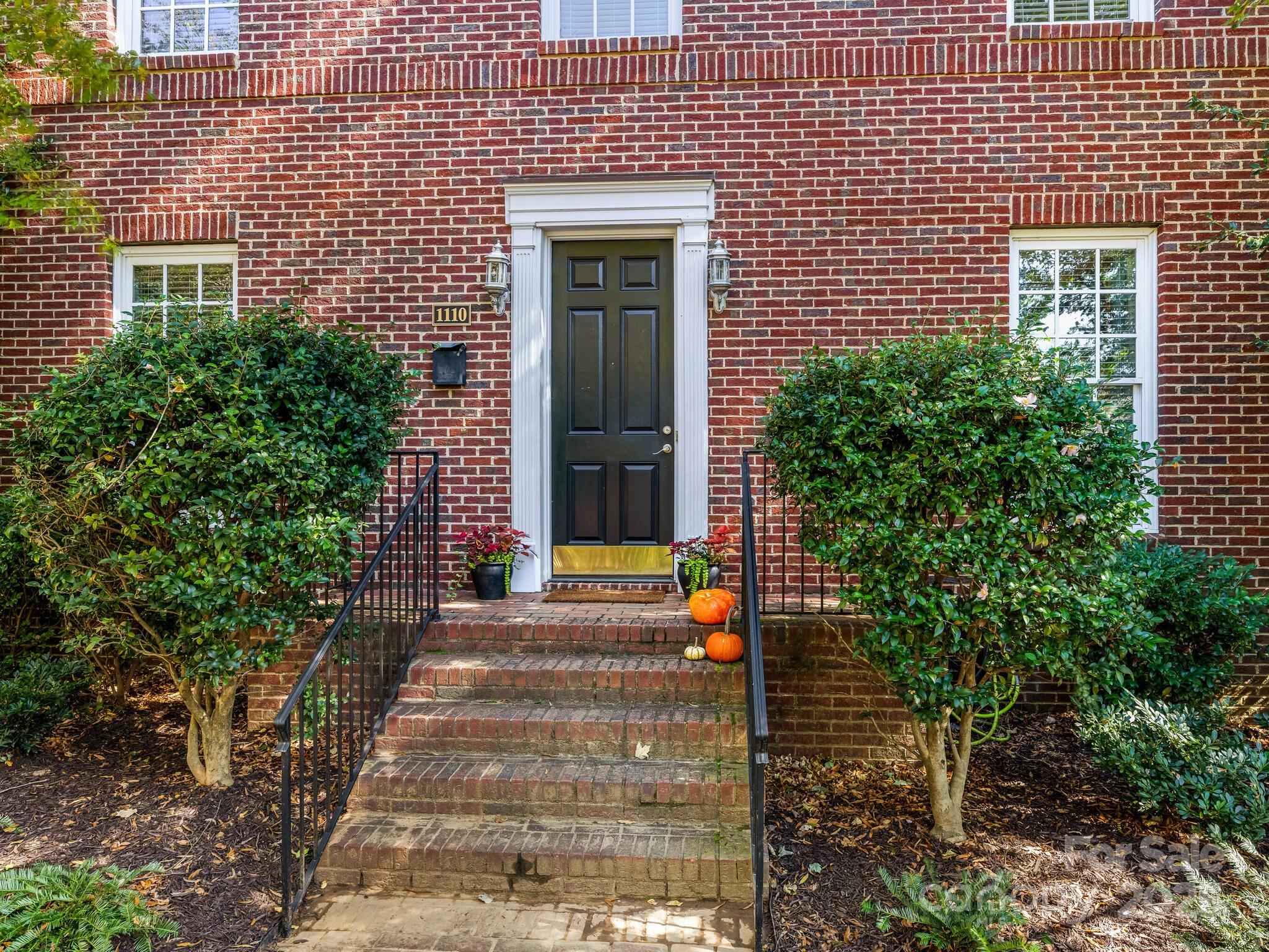 1110 Princeton Avenue Charlotte, NC 28209 - Photo 4 of 29 a front view of a house with a yard