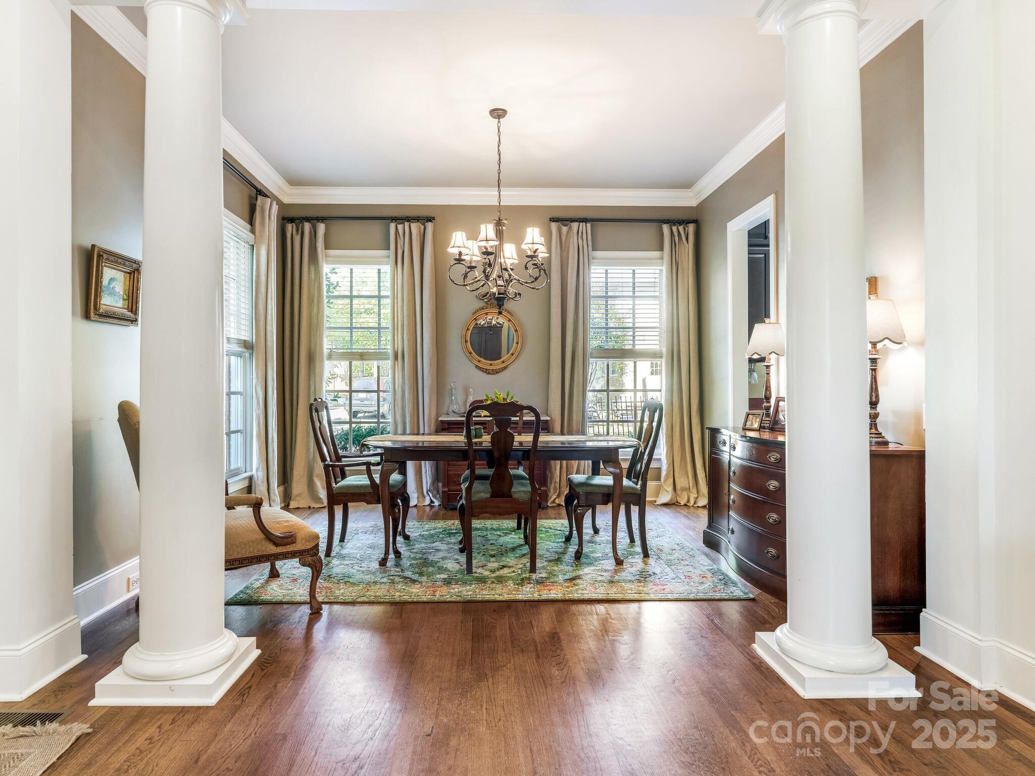 1110 Princeton Avenue Charlotte, NC 28209 - Photo 7 of 29 a view of a a dining room with furniture window and wooden floor