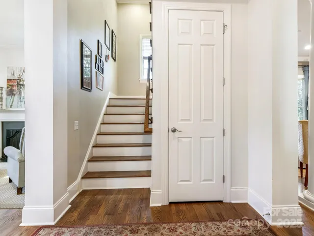 a view of entryway with wooden floor and rug