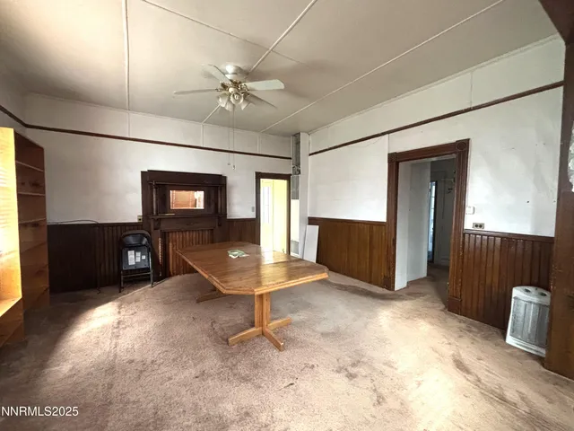 a room with furniture and a flat screen tv