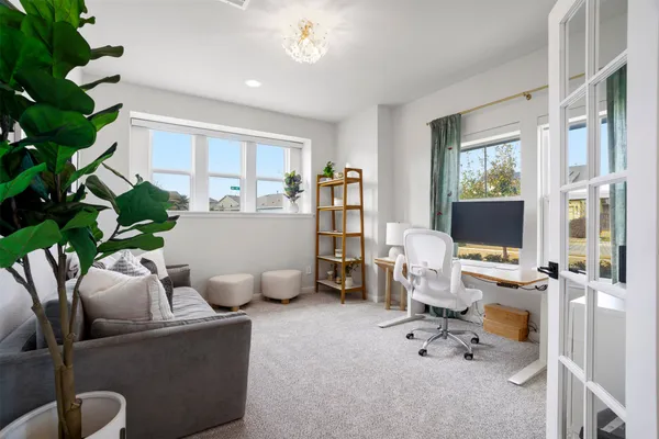a kitchen with stainless steel appliances a refrigerator and a stove