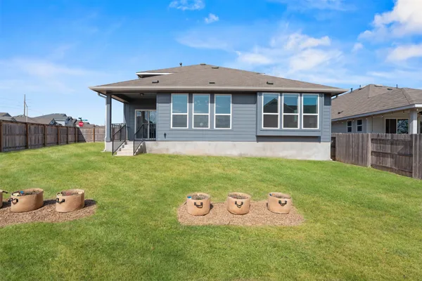 a workspace with furniture and a window