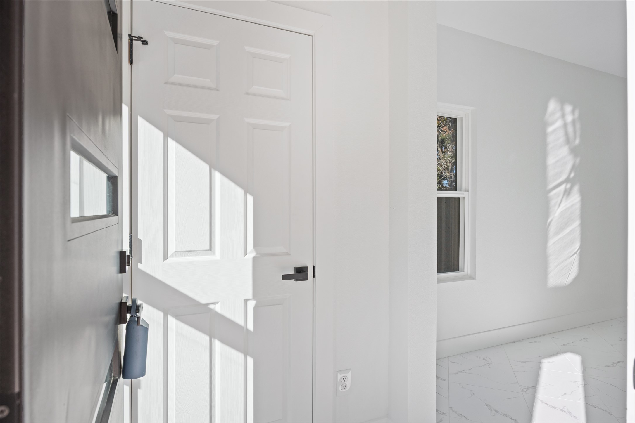 6063 Townsan Road Houston, TX 77396 - Photo 4 of 46 a view of a hallway with wooden floor and entryway