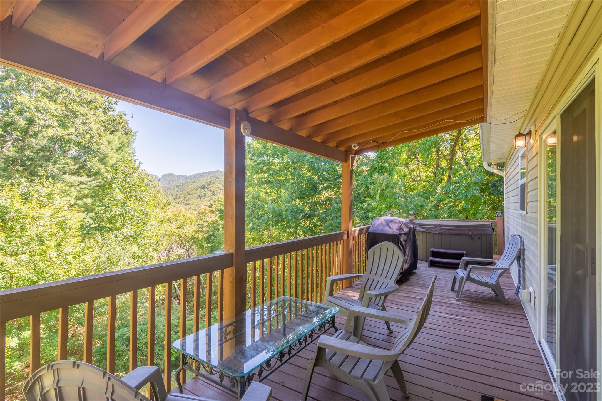 125 Parris Field Road Bryson City, NC 28713 - Photo 12 of 25 a view of a two chairs in the balcony
