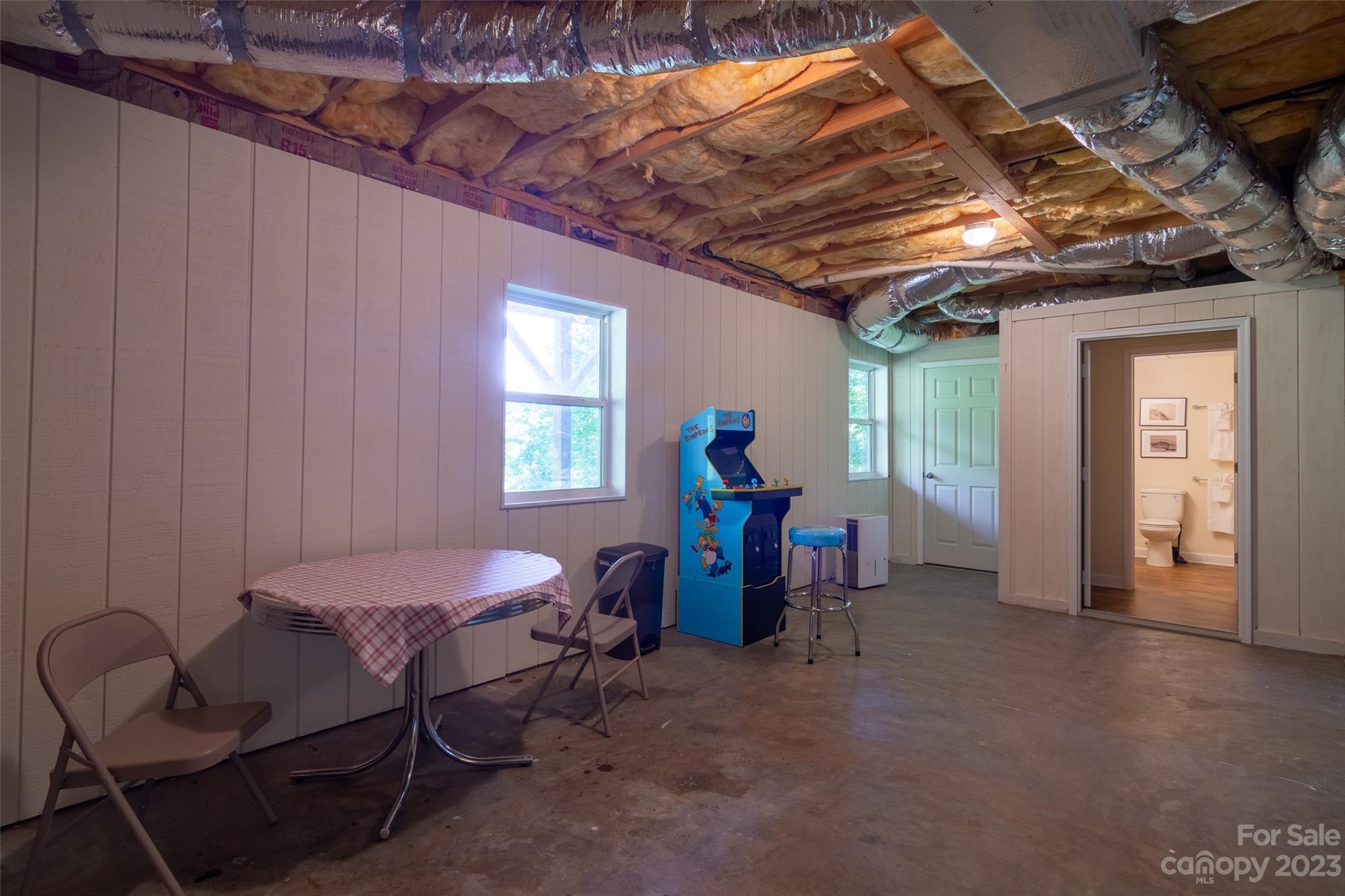 125 Parris Field Road Bryson City, NC 28713 - Photo 22 of 25 a view of a livingroom with furniture and a window