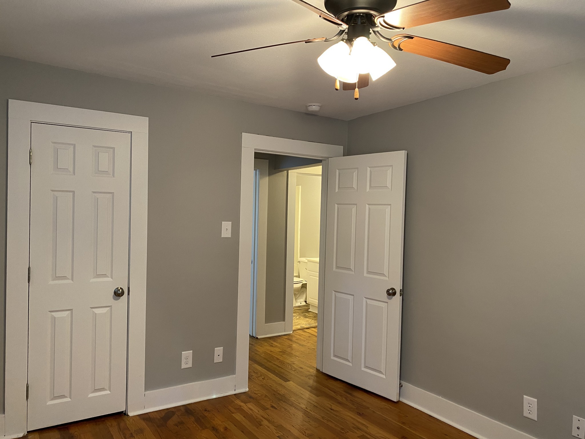 204 Rudolph Drive Clarksville, TN 37040 - Photo 13 of 19 wooden floor in an empty room with a window
