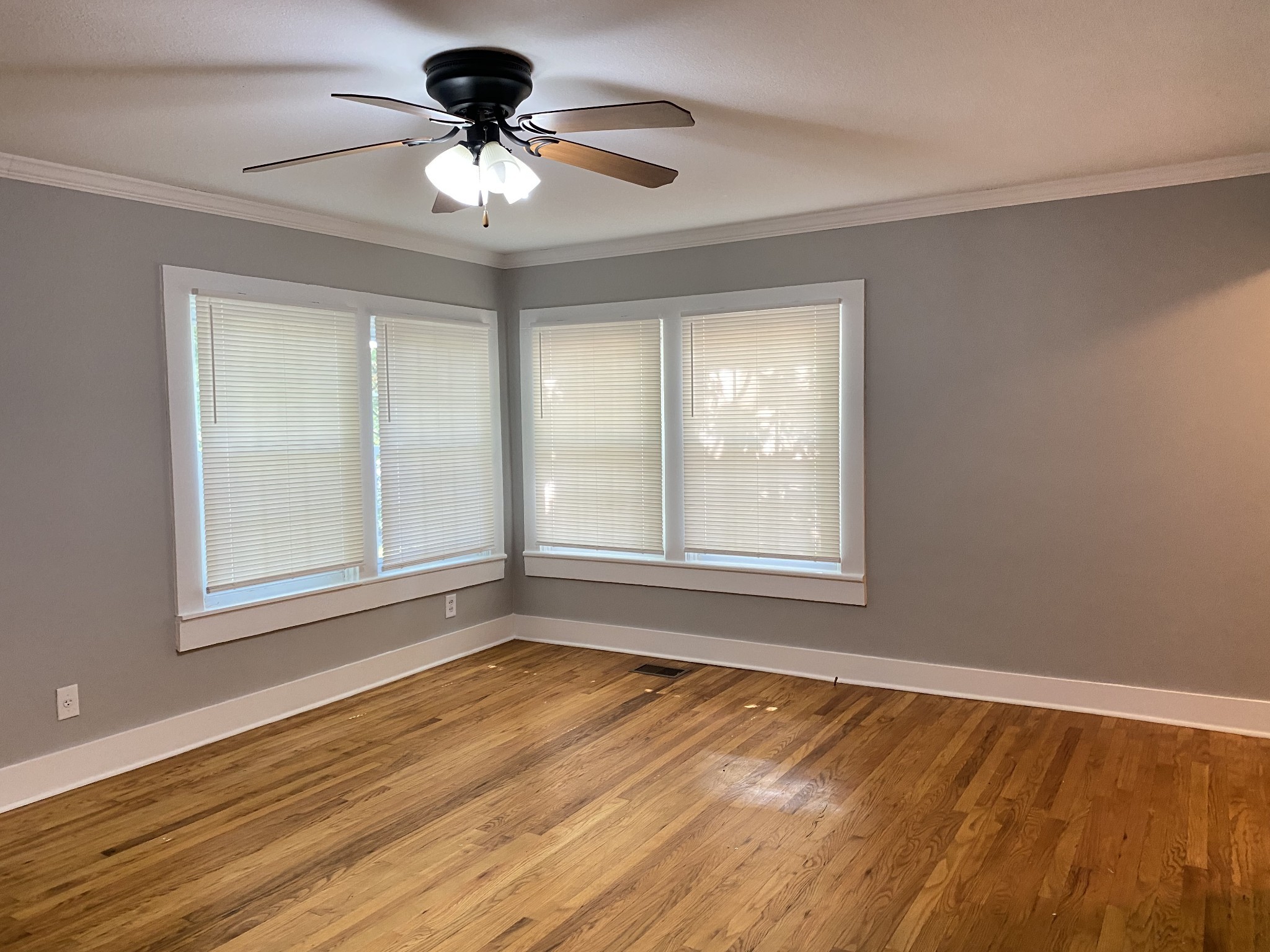 204 Rudolph Drive Clarksville, TN 37040 - Photo 5 of 19 a view of an empty room with window and wooden floor