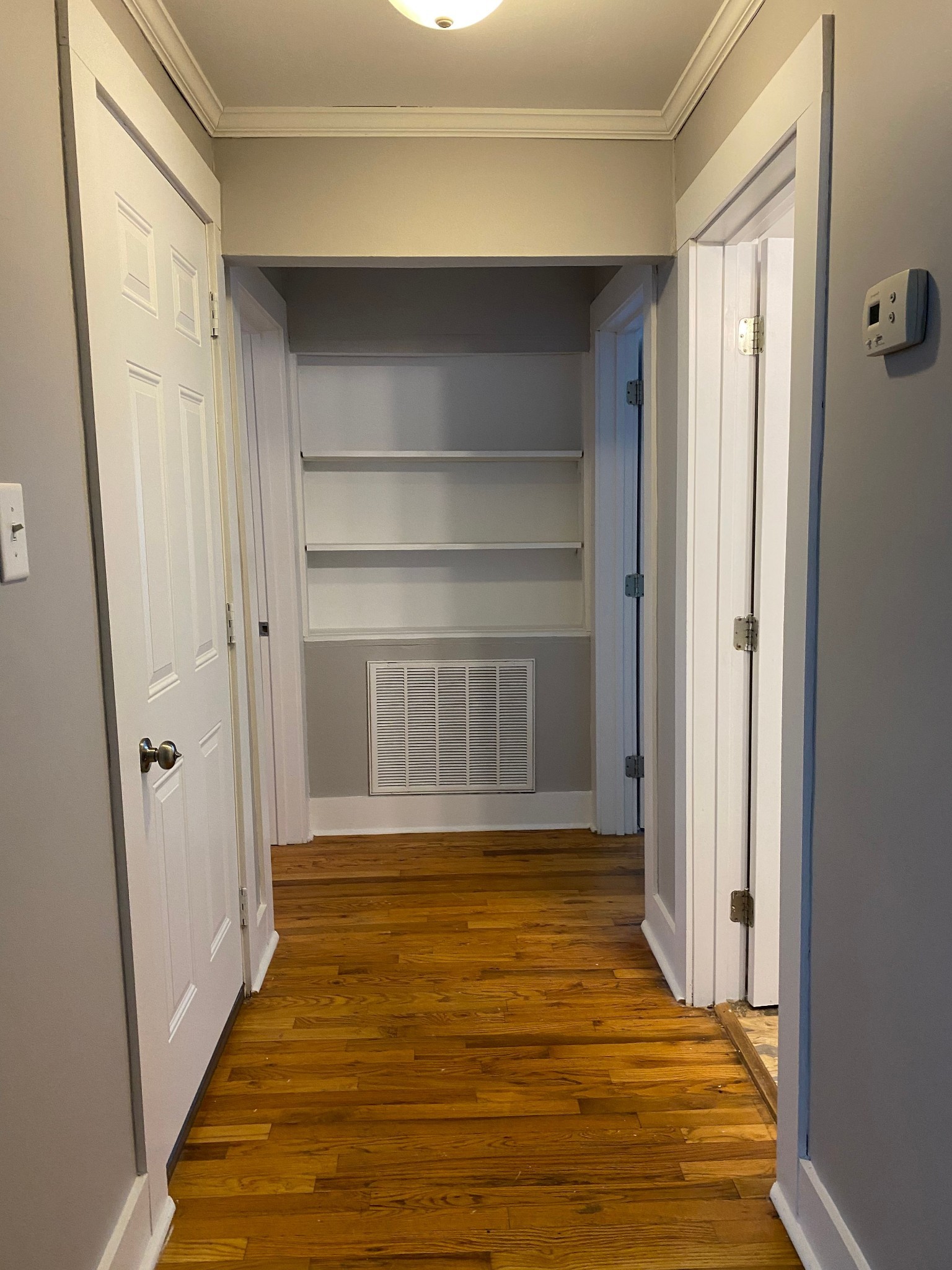 204 Rudolph Drive Clarksville, TN 37040 - Photo 9 of 19 a view of an empty room with wooden floor and a window