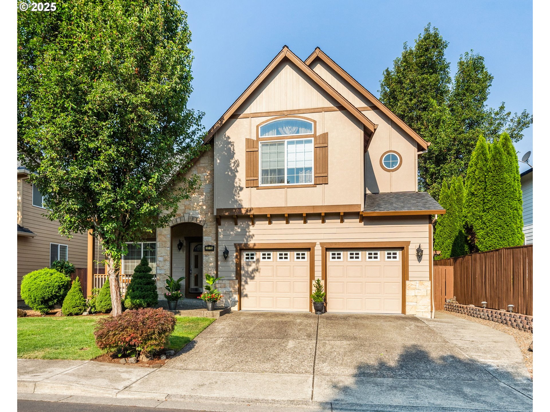3779 Northwest 4th Way Hillsboro, OR 97124 - Photo 1 of 24 a front view of a house with garden