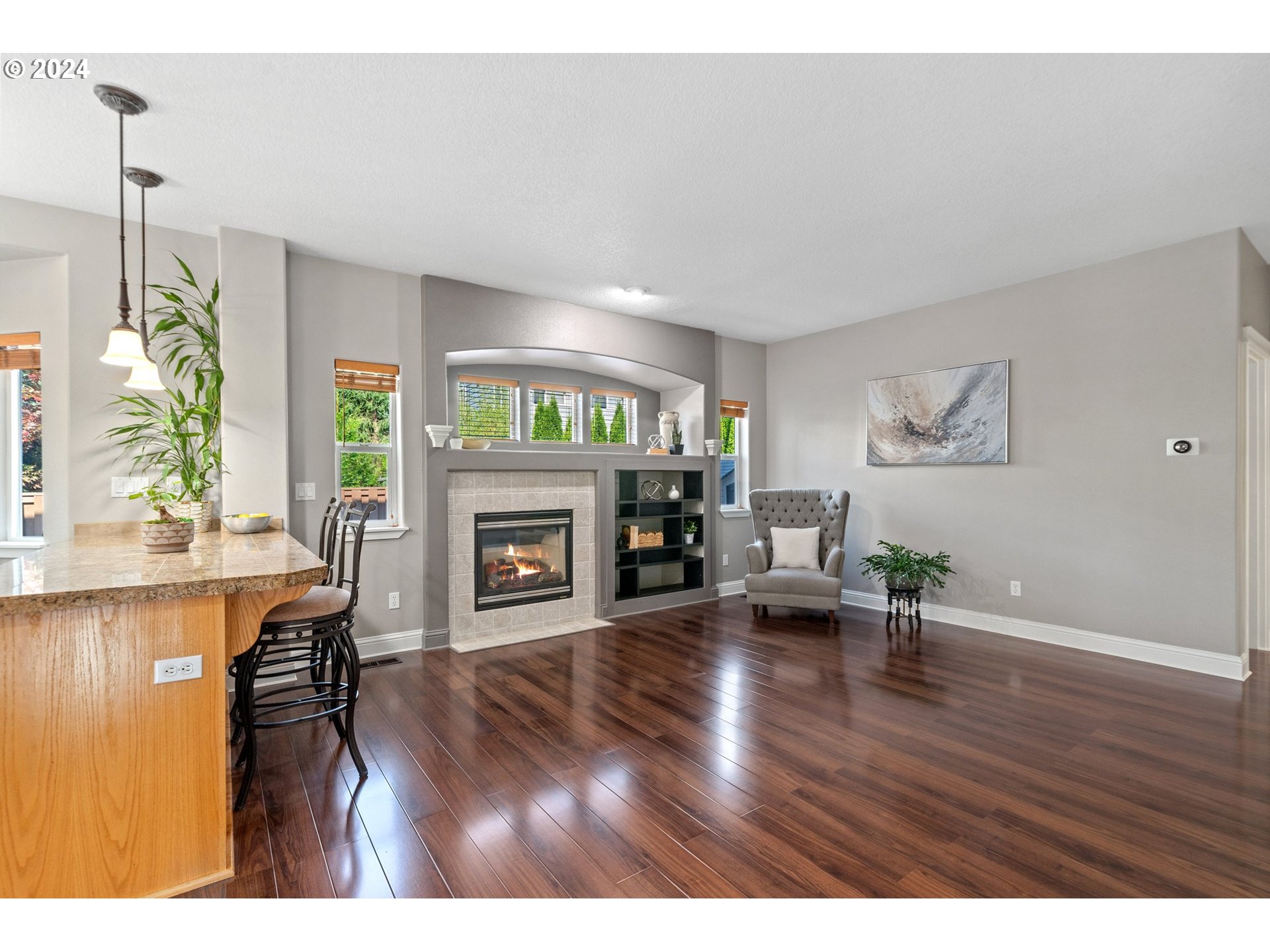 3779 Northwest 4th Way Hillsboro, OR 97124 - Photo 10 of 24 a living room with furniture and a fireplace