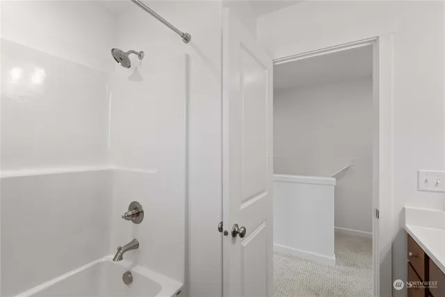 a bathroom with a bathtub