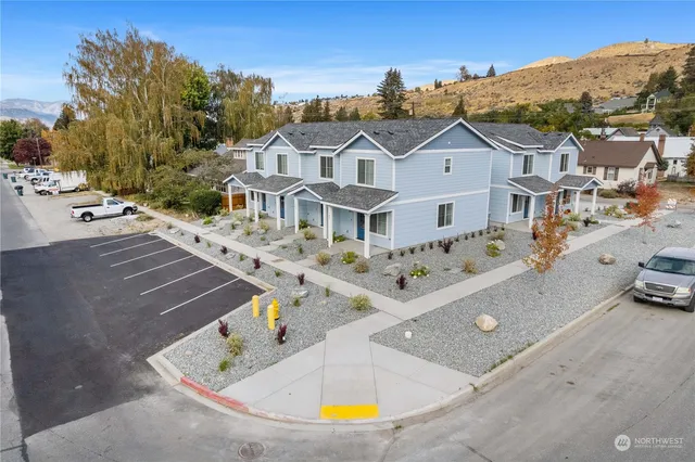 an aerial view of a house with swimming pool