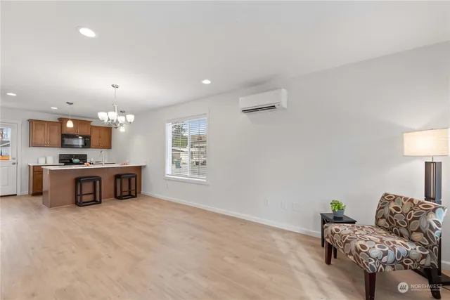 a living room with furniture and a table