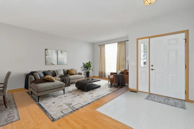 a living room with furniture and a couch