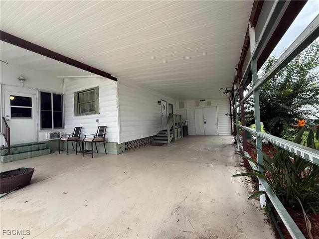 a view of dining room with furniture and garden