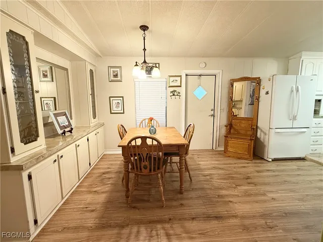 a view of a dining room with furniture