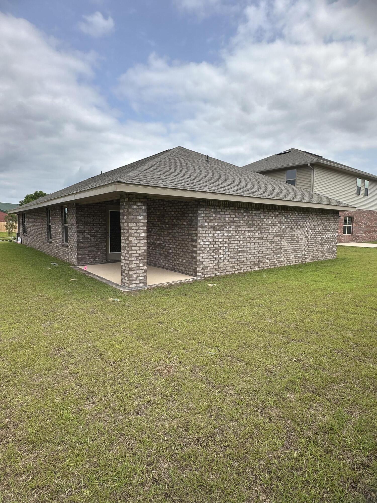 187 Ridgeway Circle Crestview, FL 32536 - Photo 20 of 22 a front view of house with pool