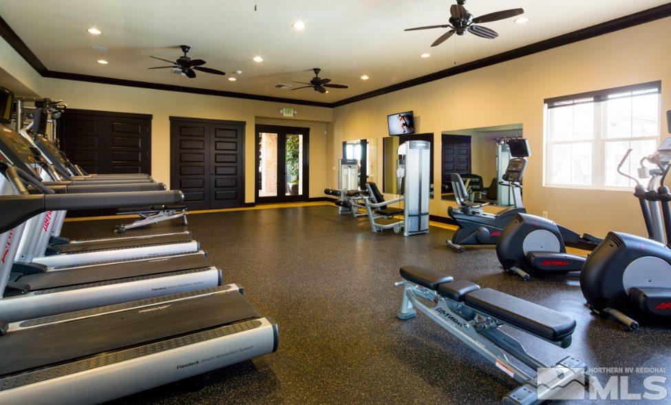 9940 Hafflinger Lane, Unit STONY RIDGE Reno, NV 89521 - Photo 13 of 17 a view of a room with gym equipment
