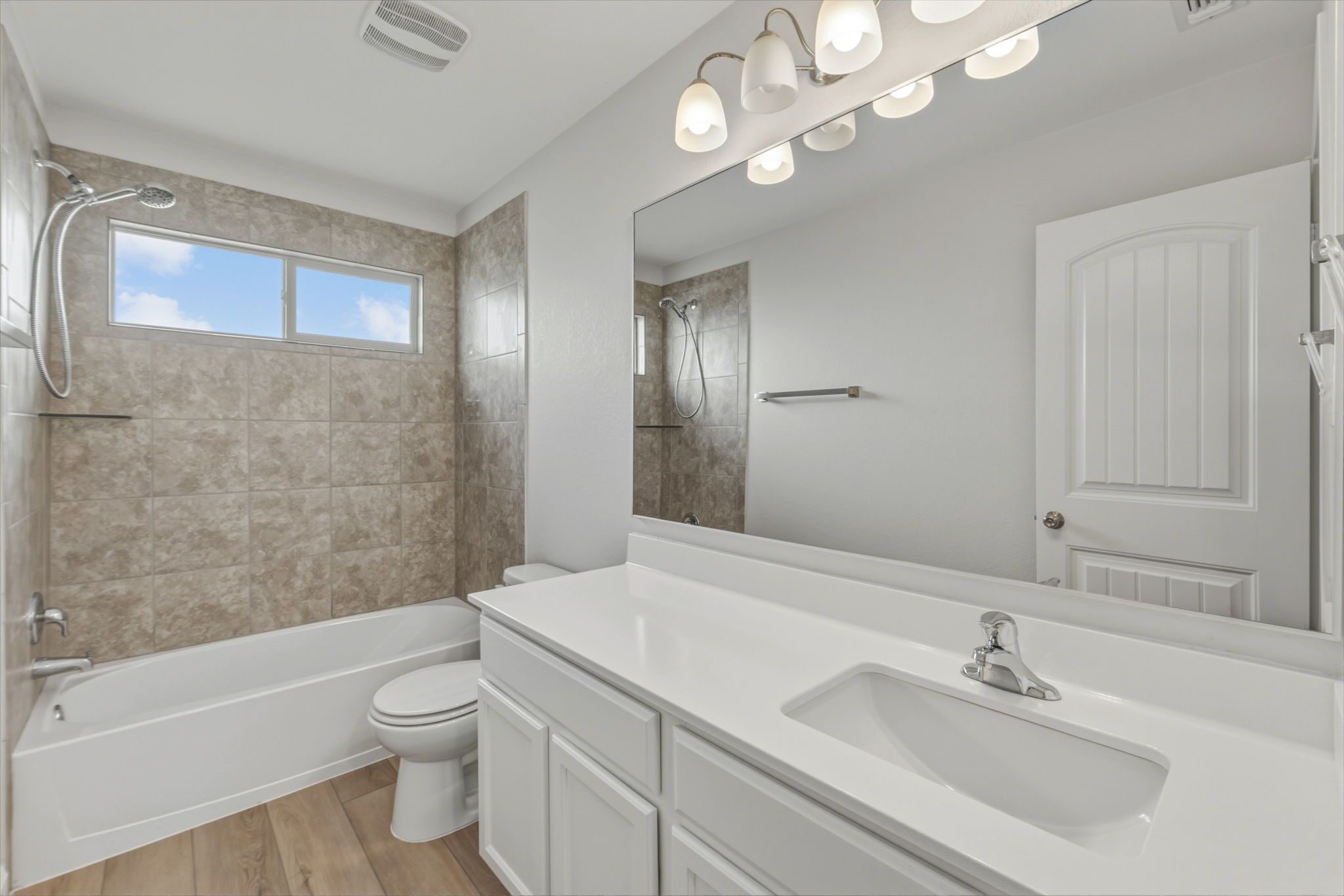 301 Serpentine Lane Jarrell, TX 76537 - Photo 26 of 39 a bathroom with a sink a toilet and shower